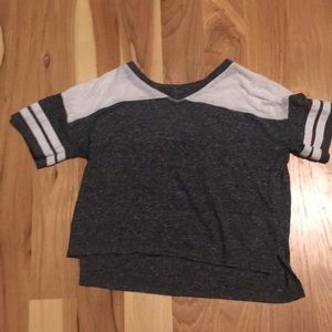 A gray and white crop top.